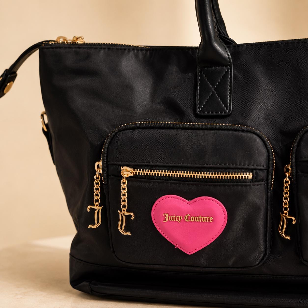 Juicy Couture Black Heart Weekend Bag, Large Black Travel Bag, Pink Heart Logo, Gold Tone Hardware, Shoulder Holdall