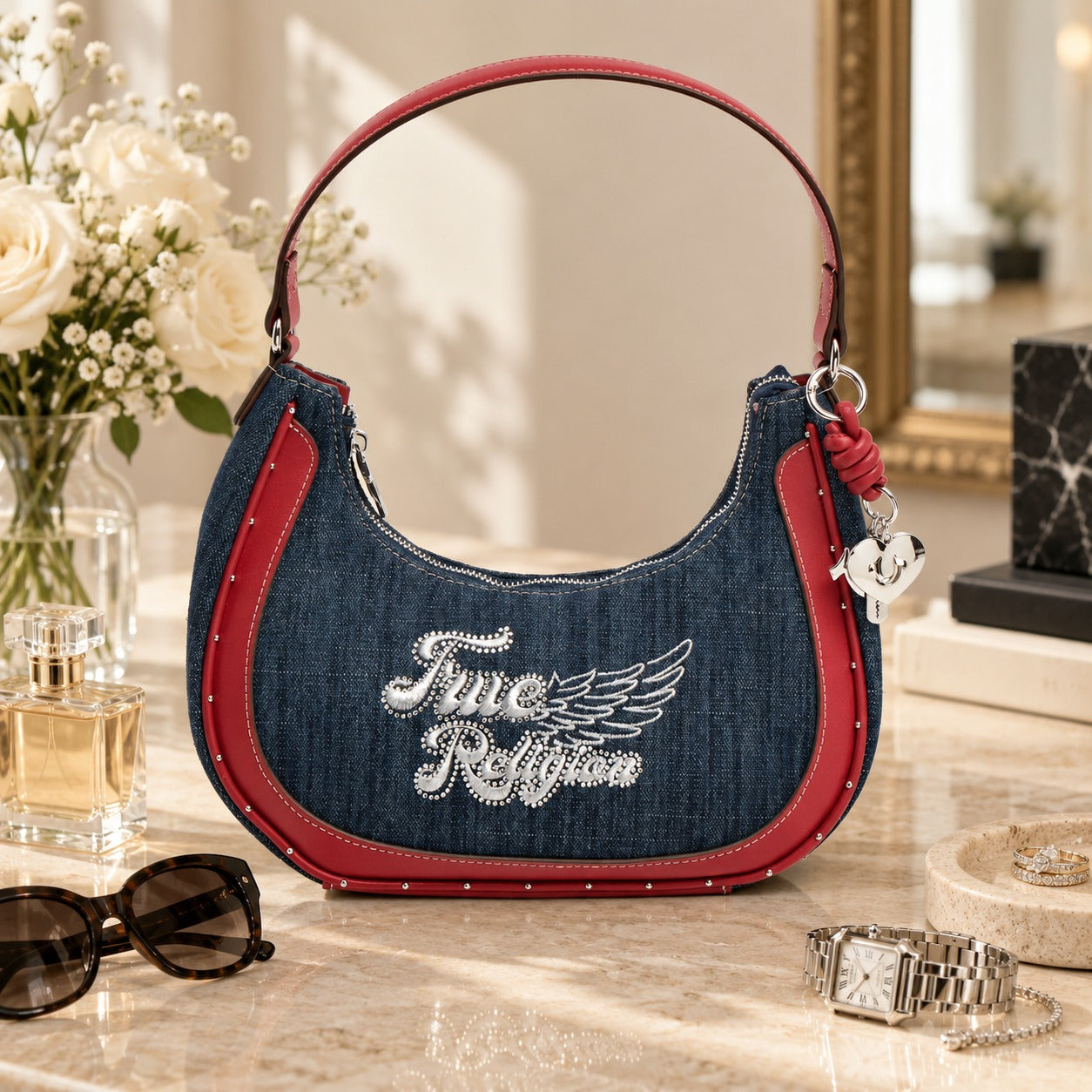 True Religion Blue Denim Hobo Bag, Red Leather Trim, Rhinestone Wing Charm